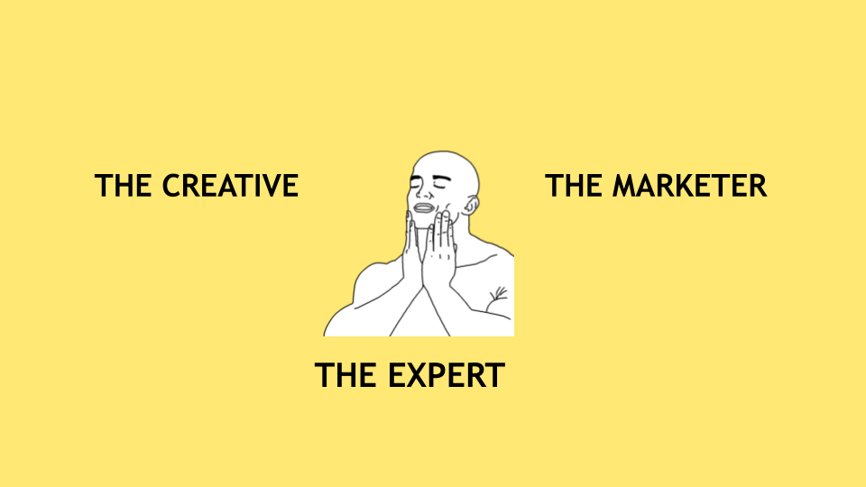 A drawing of a bald man holding his chin in bliss. Around his head is the text 'The Creative', 'The Marketer' and 'The Expert'.